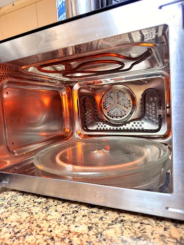 Microwave with conduction oven