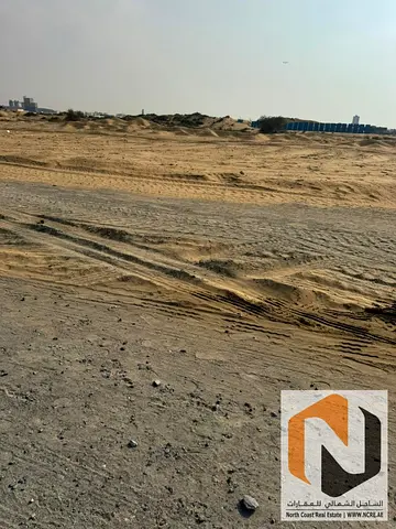 Prime corner commercial plot second plot from the main road in Al Hamriyah
