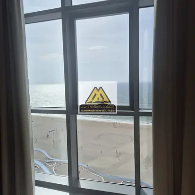 A 2-bedroom apartment for annual rent in Ajman Corniche Residences – Tower 7, featuring a full direct sea view, spacious layout, and premium finishing