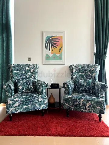 Pair of patterned wingback armchairs in  excellent condition