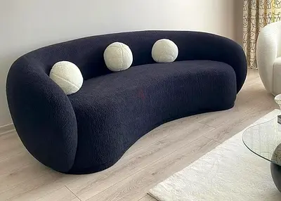 Curved Black Modern Sofa with Round Cushions