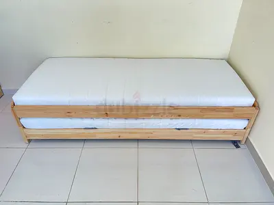 Smart option from Ikea, single bed can be converted into two single or one queen.80cm x 200cm each
