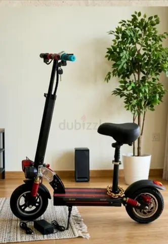 Electric scooter with seat — used, good condition