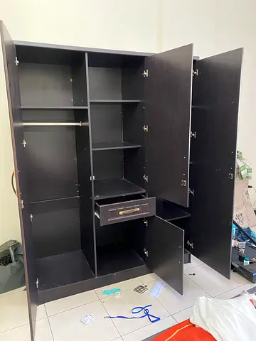 Used 3-Door Dark Wood Wardrobe with Shelves and Drawer