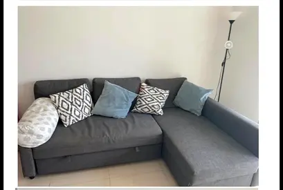 Gray L-shaped Sofa Bed with Storage — Good Condition