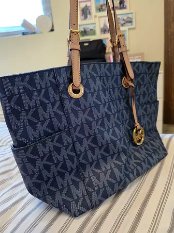 Michael Kors navy monogram tote bag with leather straps - good condition
