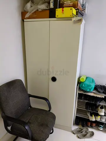 Tall metal storage cabinet - good condition