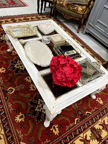 White vintage-style wooden coffee table with glass insets
