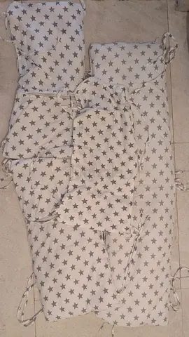 Star-print padded crib bumper / cot bumper - neutral grey