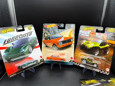 Hot Wheels die-cast car lot — 3 sealed collectors’ cars (EuroSpeed, Datsun, Meyers Manx)