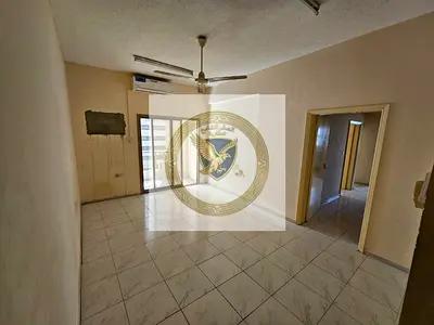 Staff accommodation: spacious 2-bedroom apartment with a living room in Abu Shagara.