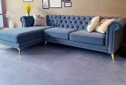 Blue Velvet L-Shaped Chesterfield Sofa with Tufted Back and Stud Detailing