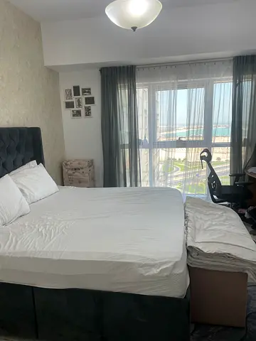 Mamzar Beach view Master Bedroom with attached Bathroom.
