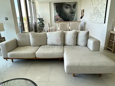 Light Beige L-shaped Linen Sofa with Wooden Base — Excellent Condition