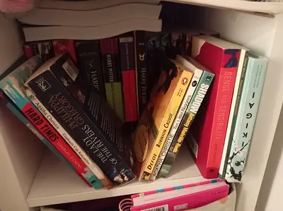 Box of mixed paperback fiction and non-fiction books (Harry Potter, classics, Percy Jackson, ect