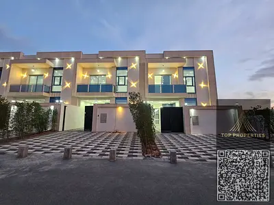 Modern villa located on a main street, registration fees included. Two floors and a rooftop terrace.
