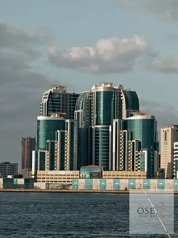 Orient Towers, one bedroom and living room, with a down payment of 165,000 and monthly installments of 4,800 dirhams. Ready to move in. The apartment