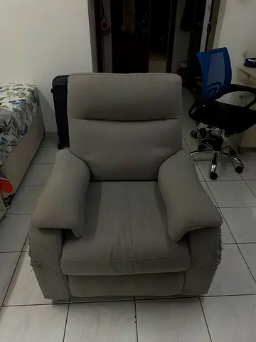 Used Grey Fabric Recliner Armchair — Comfortable but Worn