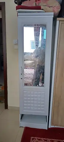 Single bed with mattress and wardrobe