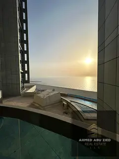 Furnished 2BHK for annual rent in Corniche Tower Ajman free AC gym pool jacuzzi parking 75k yearly 4