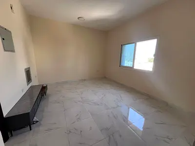 One bedroom and living room in Al Rashidiya 3 near the Corniche, 25,000 in 6 installments, large sp