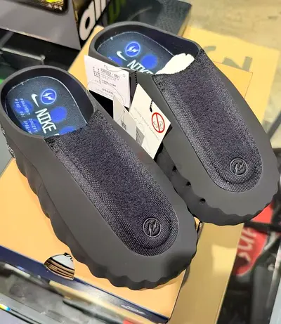 Nike slip-on clogs — black, like-new with tags, comfy sole