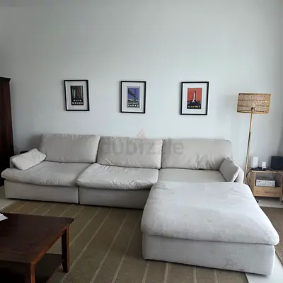 Large Light Cream L-Shaped Sofa with Ottoman