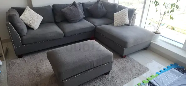 Grey L-shaped Fabric Sectional Sofa with Ottoman - Good Condition