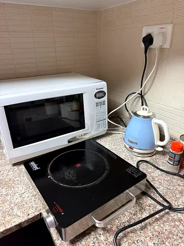 Microwave oven (with kettle and induction cooktop) - used kitchen appliances