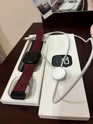Used Apple Watch (with magnetic charger) - Red Sport Band