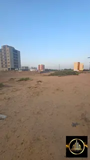 Residential/commercial land for sale in Al Yasmin | Permit G+10 | Near Sheikh Zayed Road 🏗️