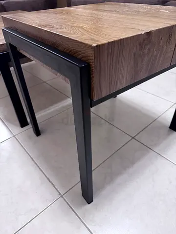 Solid wood top side table with black metal legs - good condition