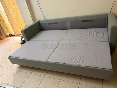 Light grey fabric sofa bed - single pull-out to double bed, good condition