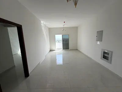 One bedroom and living room, first occupant, near Ajman Corniche, 36,000 in 4 installments, master bedroom, balcony, high-end finishes, prime location