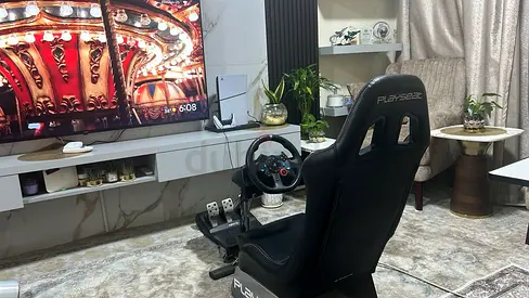 PlayStation racing simulator with seat and set up.