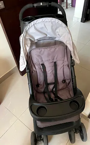 Used single baby stroller with canopy and cup holders