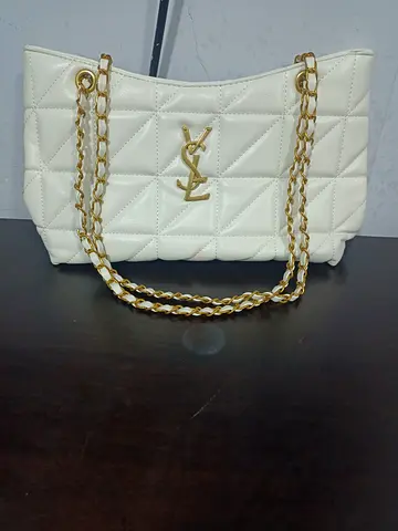 White quilted YSL-style shoulder bag with gold chain straps