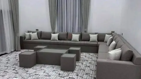 Large L-shaped Grey Majlis Sofa Set with Matching Poufs and Coffee Table