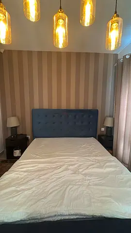 King bed frame with upholstered headboard - good condition