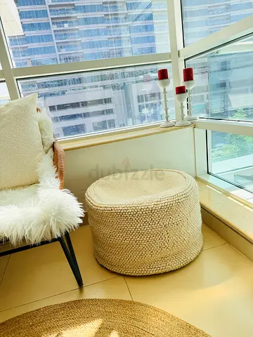 Cream knitted round pouf/ottoman – excellent condition