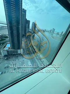 2 bedroom apartment sea view Al Khan luxury tower balcony gym pool free parking central AC