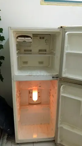 Used Top-Freezer Refrigerator - Small, Working Light, Needs Cleaning