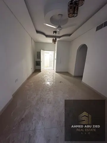 Two bedrooms and a living room for annual rent in Al Muwaihat 3, Ajman. Central air conditioning, b