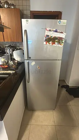 Silver double-door refrigerator - good working condition