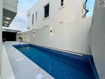 Two-story villa with a rooftop, elevator, and swimming pool. Freehold ownership. Price includes reg