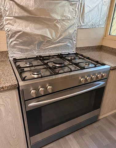 Stainless Steel Gas Cooker with Large Oven بوتجاز طباخ