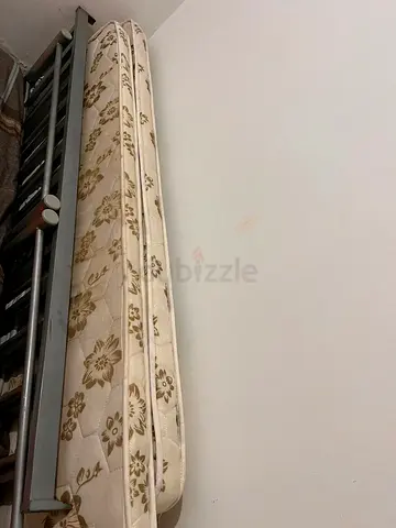 Single mattress (used) - floral pattern