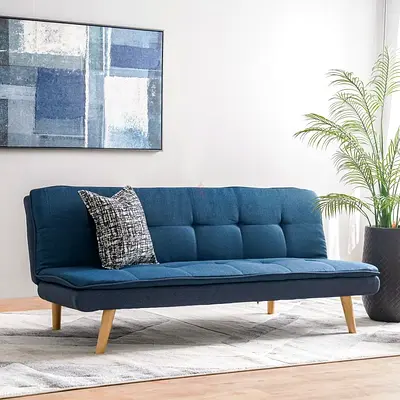 Blue convertible sofa bed / futon in good condition