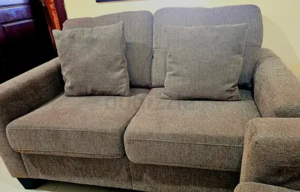 Comfortable 2-Seater Grey Fabric Sofa - Good Condition