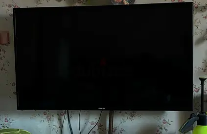 Sony 43-inch LED TV with Soundbar and Tv stand with storage Good Working Condition